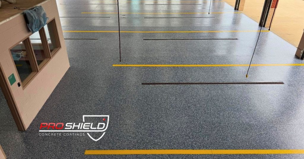 Blue speckled flooring with yellow lines